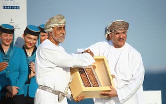 MUSCAT, OMAN - NOVEMBER 07:  Mohammed bin Mafoodh Al Ardhi, Chairman of NBO (R) presents a gift to Chief Guest His Highness Sayyid Shihab Bin Tariq Al Said, Advisor to His Majesty The Sultan Qaboos bin Said (L) after the final round of the NBO Golf Classic Grand Final at the Almouj Golf Club, The Wave  on November 7, 2015 in Muscat, Oman.  (Photo by Francois Nel/Getty Images)