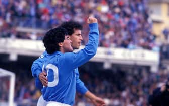 NAPLES, ITALY : Diego Armando Maradona,exults after scoring a goal along with Careca during a Serie A 84-85  match  at Stadio San Paolo on 1984 in Naples, Italy. (Photo by Stefano Montesi - Corbis/Corbis via Getty Images)"n