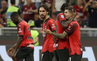 AC Milan’s Christian Pulisic (R)   jubilates with his teammates after scoring goal of 1 to 0 during the Italian serie A soccer match between AC Milan and Lazio at Giuseppe Meazza stadium in Milan, 30 September August 2023.ANSA / MATTEO BAZZI