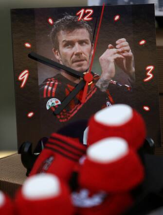 AC Milan's David Beckham clock on sale outside the ground  (Photo by Mike Egerton - PA Images via Getty Images)