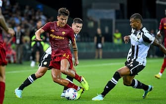 Roma's Paulo Dybala in action against Udinese's Nehuen Perez and Udinese's Walace Souza Silva  during  Udinese Calcio vs AS Roma, italian soccer Serie A match in Udine, Italy, September 04 2022