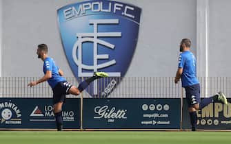 EMPOLI, ITALY - AUGUST 29: Matias Silvestre and Levan Mchelidze of Empoli FC warm up during training session on August 29, 2018 in Empoli, Italy.  (Photo by Gabriele Maltinti/Getty Images)