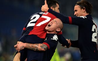 Cagliari's forward Marco Sau (L) celebrates with his teammates after scoring the 1-0 goal lead during the Italian Serie A soccer match between SS Lazio and Cagliari Calcio at Olympic stadium in Rome, Italy, 05 January 2013. ANSA/CLAUDIO ONORATI
  




