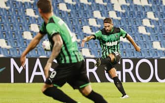 Sassuolo's  Domenico Berardi  (R) scores the 1-0 goal during the Italian Serie A soccer match US Sassuolo vs US Lecce  at Mapei Stadium in Reggio Emilia, Italy, 20 August 2022. ANSA / SERENA CAMPANINI