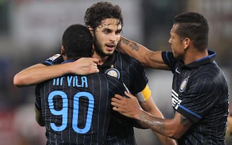 ROME, ITALY - NOVEMBER 30:  Andrea Ranocchia (C) with his teammate Yann M'Vila and Guarin (R) of FC Internazionale Milano celebrates after scoring the first team's goal during the Serie A match between AS Roma and FC Internazionale Milano at Stadio Olimpico on November 30, 2014 in Rome, Italy.  (Photo by Paolo Bruno/Getty Images)