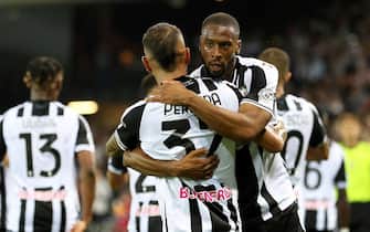 Udinese's Roberto Pereyra (L) jubilates with his teammate Norberto Beto after scoring the goal during the Italian Serie A soccer match Udinese Calcio vs AS Roma at the Friuli - Dacia Arena stadium in Udine, Italy, 4 September 2022. ANSA / GABRIELE MENIS