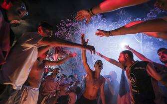 Palermo fans celebrate the promotion of the team to Serie B in Piazza Politeama in Palermo, 13 June 2022. ANSA / IGOR PETYX