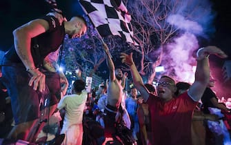 Palermo fans celebrate the promotion of the team to Serie B in Piazza Politeama in Palermo, 13 June 2022. ANSA / IGOR PETYX