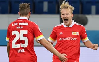epa08794080 Joel Pohjanpalo (R) of Union Berlin celebrates scoring the 2-1 lead during the German Bundesliga match between TSG Hoffenheim and 1. FC Union Berlin at PreZero-Arena in Sinsheim, Germany, 02 November 2020.  EPA/Matthias Hangst / POOL CONDITIONS - ATTENTION:  The DFL regulations prohibit any use of photographs as image sequences and/or quasi-video.