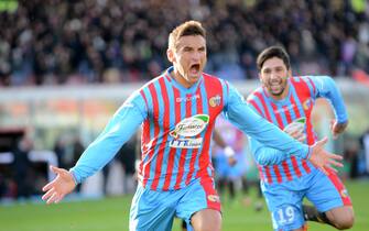 Catania's forward Gonzalo Bergessio exults after scoring the goal of 1-0 during the italian serie A soccer match Catania-Bologna at Angelo Massimino stadium, Catania, 06 January 2014.  ANSA/ ORIETTA SCARDINO