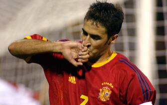 YEREVAN, ARMENIA:  Spaniard Raul Gonzalez kisses his ring after scoring the second goal for Spain during a Euro 2004 classification match at Vazgen Sargsyan stadium in Yerevan 11 October 2003.    (Photo credit should read JAVIER SORIANO/AFP via Getty Images)