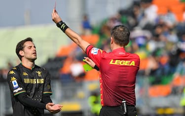 The Referee of the match Orsato show Red card for Veneziaâ&#x80;&#x99;s Thomas Henry  during  Venezia FC vs UC Sampdoria, italian soccer Serie A match in Venice, Italy, March 20 2022