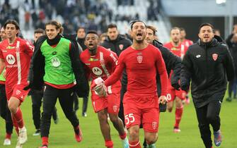 AC Monza team celebrates the victory; Armando Izzo (AC Monza) in the foreground  during  Juventus FC vs AC Monza, italian soccer Serie A match in Turin, Italy, January 29 2023