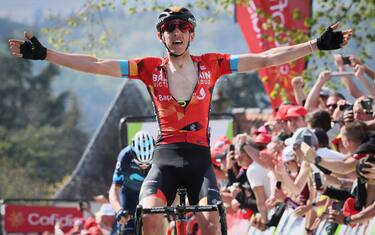 Belgian cyclist Dylan Teuns of Bahrain Victorious celebrates as he crosses the finish line to win the 86th edition of the men's race 'La Fleche Wallonne', a one day cycling race (Waalse Pijl - Walloon Arrow), 202,1 km from Blegny to Huy, on April 20, 2022. - Belgium OUT (Photo by BENOIT DOPPAGNE / BELGA / AFP) / Belgium OUT (Photo by BENOIT DOPPAGNE/BELGA/AFP via Getty Images)