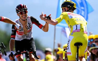PLANCHE DES BELLES FILLES, FRANCE - JULY 08: (L-R) Brandon Mcnulty of United States, George Bennett of New Zealand and Tadej Pogacar of Slovenia and UAE Team Emirates - Yellow Leader Jersey celebrates at finish line during the 109th Tour de France 2022, Stage 7 a 176,3km stage from Tomblaine to La Super Planche des Belles Filles 1141m / #TDF2022 / #WorldTour / on July 08, 2022 in Planche des Belles Filles, France. (Photo by Tim de Waele/Getty Images)