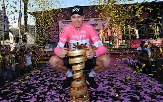 British Britain's Chris Froome poses with the trophy of the Giro d'Italia cycling race, in Rome, Sunday, May 27, 2018. Chris Froome has won the Giro d'Italia for his third consecutive Grand Tour victory. The four-time Tour de France champion had no trouble protecting his 46-second lead over defending champion Tom Dumoulin in Sunday's mostly ceremonial final stage through historic Rome. ANSA/DANIEL DAL ZENNARO