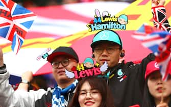 SHANGHAI, CHINA - APRIL 14: Lewis Hamilton of Great Britain and Mercedes GP fans enjoy the atmosphere during the F1 Grand Prix of China at Shanghai International Circuit on April 14, 2019 in Shanghai, China. (Photo by Dan Istitene/Getty Images)