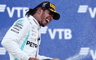 SOCHI, RUSSIA - SEPTEMBER 29: Race winner Lewis Hamilton of Great Britain and Mercedes GP celebrates on the podium during the F1 Grand Prix of Russia at Sochi Autodrom on September 29, 2019 in Sochi, Russia. (Photo by Mark Thompson/Getty Images)