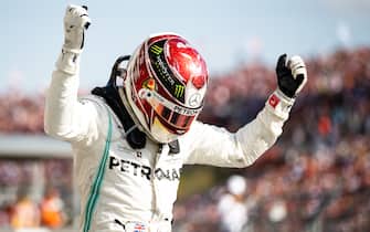 BUDAPEST, HUNGARY - AUGUST 04: Race winner Lewis Hamilton of Great Britain and Mercedes GP celebrates in parc ferme  during the F1 Grand Prix of Hungary at Hungaroring on August 04, 2019 in Budapest, Hungary. (Photo by Lars Baron/Getty Images)