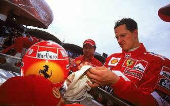 14 Oct 2001:  Ferrari driver Michael Schumacher of Germany during the Formula One Japanese Grand Prix held at the Suzuka Circuit in Suzuka, Japan. \ Mandatory Credit: Clive Mason /Allsport