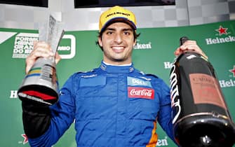 1188274054 SAO PAULO, BRAZIL - NOVEMBER 17: Carlos Sainz of Spain and McLaren F1 celebrates after later being awarded third place in the F1 Grand Prix of Brazil at Autodromo Jose Carlos Pace on November 17, 2019 in Sao Paulo, Brazil. (Photo by Getty Images/Getty Images)