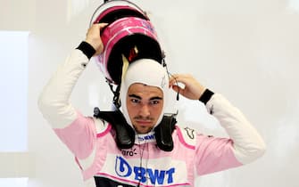 SAO PAULO, BRAZIL - NOVEMBER 15: Lance Stroll of Canada and Racing Point prepares to drive in the garage during practice for the F1 Grand Prix of Brazil at Autodromo Jose Carlos Pace on November 15, 2019 in Sao Paulo, Brazil. (Photo by Charles Coates/Getty Images)