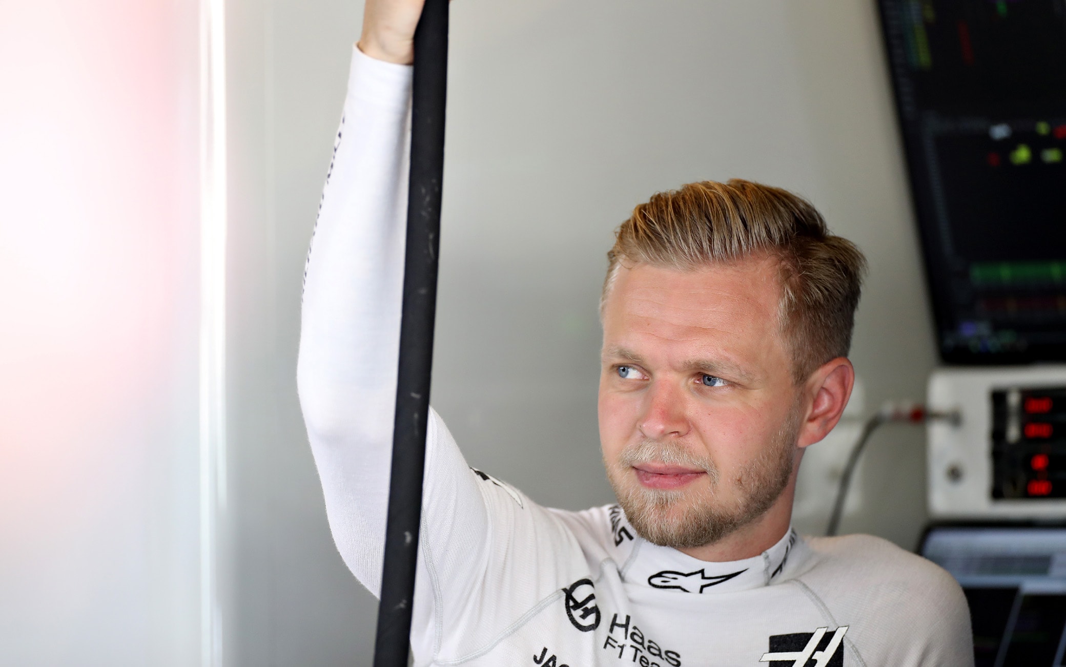 1191032174 ABU DHABI, UNITED ARAB EMIRATES - NOVEMBER 30: Kevin Magnussen of Denmark and Haas F1 prepares to drive in the garage during final practice for the F1 Grand Prix of Abu Dhabi at Yas Marina Circuit on November 30, 2019 in Abu Dhabi, United Arab Emirates. (Photo by Mark Thompson/Getty Images)