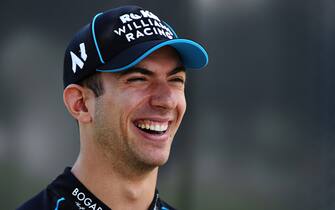 MELBOURNE, AUSTRALIA - MARCH 12: Nicholas Latifi of Canada and Williams laughs in the Paddock during previews ahead of the F1 Grand Prix of Australia at Melbourne Grand Prix Circuit on March 12, 2020 in Melbourne, Australia. (Photo by Charles Coates/Getty Images)