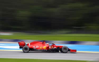 TOPSHOT - Ferrari's German driver Sebastian Vettel steers his car during the second practice session at the Austrian Formula One Grand Prix on July 3, 2020 in Spielberg, Austria. - Seven months after they last competed in earnest, the Formula One circus will push a post-lockdown re-set button to open the 2020 season in Austria on July 5. (Photo by Mark THOMPSON / POOL / AFP) (Photo by MARK THOMPSON/POOL/AFP via Getty Images)