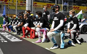 JULY 05: Drivers taking a knee during the Austrian GP on Sunday July 05, 2020. (Photo by Mark Sutton / Sutton Images)