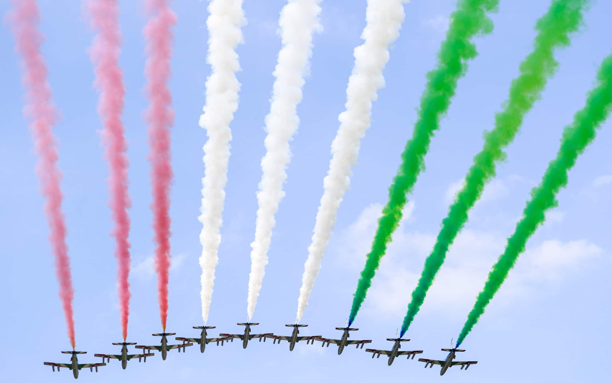 AUTODROMO NAZIONALE MONZA, ITALY - SEPTEMBER 06: The Italian Air Force Aerobatic Display Team, Frecce Tricolori, display over the grid in their Aermacchi MB339A jet trainers during the Italian GP at Autodromo Nazionale Monza on Sunday September 06, 2020 in Monza, Italy. (Photo by Steven Tee / LAT Images)