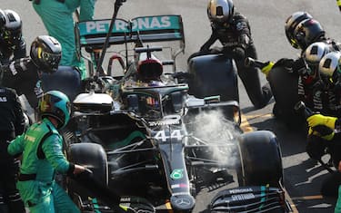 MUGELLO CIRCUIT, ITALY - SEPTEMBER 13: Lewis Hamilton, Mercedes F1 W11 EQ Performance, makes a pit stop during the Tuscany GP at Mugello Circuit on Sunday September 13, 2020, Italy. (Photo by Steven Tee / LAT Images)
