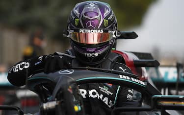 IMOLA, ITALY - NOVEMBER 01: Race winner Lewis Hamilton of Great Britain and Mercedes GP climbs out of his car in parc ferme during the F1 Grand Prix of Emilia Romagna at Autodromo Enzo e Dino Ferrari on November 01, 2020 in Imola, Italy. (Photo by Rudy Carezzevoli/Getty Images)