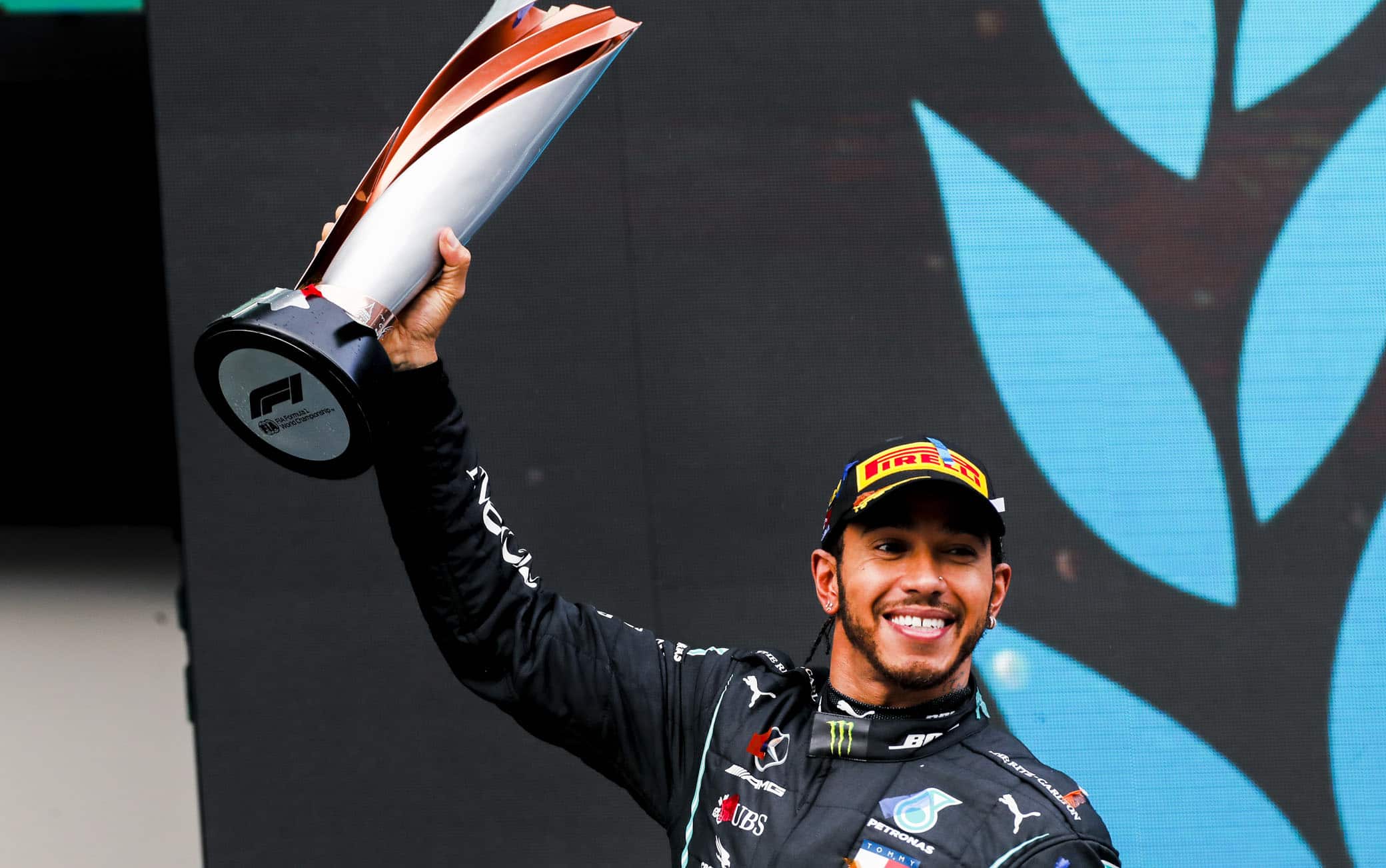 ISTANBUL PARK, TURKEY - NOVEMBER 15: Seven times world drivers champion Lewis Hamilton, Mercedes-AMG Petronas F1, 1st position, lifts his trophy on the podium during the Turkish GP at Istanbul Park on Sunday November 15, 2020, Turkey. (Photo by Steven Tee / LAT Images)
