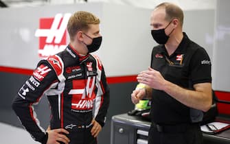 BAHRAIN INTERNATIONAL CIRCUIT, BAHRAIN - DECEMBER 02: Mick Schumacher in the garage for his seat fitting with his race engineer Gary Gannon during the Sakhir GP at Bahrain International Circuit on Wednesday December 02, 2020 in Sakhir, Bahrain. (Photo by Andy Hone / LAT Images)