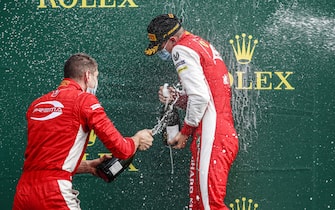 SPA-FRANCORCHAMPS, BELGIUM - AUGUST 30: Mick Schumacher (DEU, PREMA RACING) celebrates on the podium with the champagne at Spa-Francorchamps on Sunday August 30, 2020 in Spa, Belgium. (Photo by Zak Mauger / LAT Images)