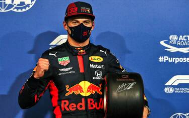 YAS MARINA CIRCUIT, UNITED ARAB EMIRATES - DECEMBER 12: Max Verstappen, Red Bull Racing, with the Pole Position Award during the Abu Dhabi GP at Yas Marina Circuit on Saturday December 12, 2020 in Abu Dhabi, United Arab Emirates.