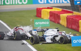 SPA-FRANCORCHAMPS, BELGIUM - AUGUST 30: George Russell, Williams FW43 and Antonio Giovinazzi, Alfa Romeo Racing C39, both start to exit their cars after a collision on track during the Belgian GP at Spa-Francorchamps on Sunday August 30, 2020 in Spa, Belgium. (Photo by Zak Mauger / LAT Images)