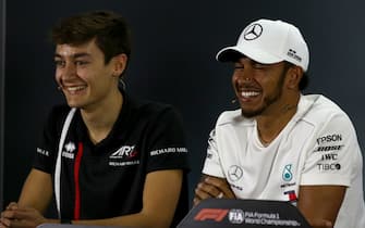 YAS MARINA CIRCUIT, UNITED ARAB EMIRATES - NOVEMBER 22: George Russell, Williams Racing and Lewis Hamilton, Mercedes AMG F1 in the press conference during the Abu Dhabi GP at Yas Marina Circuit on November 22, 2018 in Yas Marina Circuit, United Arab Emirates. (Photo by Sutton Images)