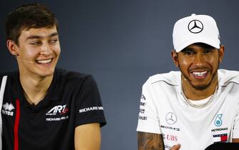 2018 Abu Dhabi GP YAS MARINA CIRCUIT, UNITED ARAB EMIRATES - NOVEMBER 22: Lewis Hamilton, Mercedes AMG F1, and George Russell, Williams Racing, in the press conference during the Abu Dhabi GP at Yas Marina Circuit on November 22, 2018 in Yas Marina Circuit, United Arab Emirates. (Photo by Andy Hone / LAT Images)