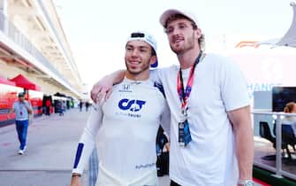 AUSTIN, TEXAS - OCTOBER 24: Pierre Gasly of France and Scuderia AlphaTauri meets Logan Paul in the Paddock before the F1 Grand Prix of USA at Circuit of The Americas on October 24, 2021 in Austin, Texas. (Photo by Alex Bierens de Haan - Formula 1/Formula 1 via Getty Images)