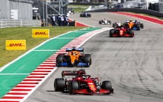 CIRCUIT OF THE AMERICAS, UNITED STATES OF AMERICA - OCTOBER 24: Charles Leclerc, Ferrari SF21, leads Daniel Ricciardo, McLaren MCL35M, and Carlos Sainz, Ferrari SF21 during the United States GP   at Circuit of the Americas on Sunday October 24, 2021 in Austin, United States of America. (Photo by Zak Mauger / LAT Images)