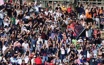 Fans watch the the second practice session at Hermanos Rodriguez racetrack in Mexico City, on November 5, 2021, ahead of the Formula One Mexico Grand Prix. (Photo by PEDRO PARDO / AFP) (Photo by PEDRO PARDO/AFP via Getty Images)