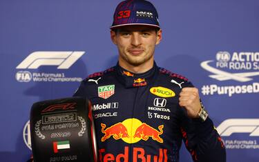 ABU DHABI, UNITED ARAB EMIRATES - DECEMBER 11: Pole position qualifier Max Verstappen of Netherlands and Red Bull Racing celebrates in parc ferme  during qualifying ahead of the F1 Grand Prix of Abu Dhabi at Yas Marina Circuit on December 11, 2021 in Abu Dhabi, United Arab Emirates. (Photo by Dan Istitene - Formula 1/Formula 1 via Getty Images)