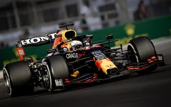 ABU DHABI - Max Verstappen of Red Bull Racing during the Abu Dhabi Grand Prix at Yas Marina Circuit on December 12, 2021 in Abu Dhabi, United Arab Emirates. REMKO DE WAAL (Photo by ANP Sport via Getty Images)