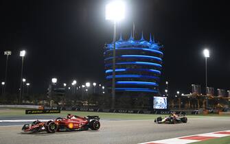 Formula 1 2022: Bahrain GP BAHRAIN INTERNATIONAL CIRCUIT, BAHRAIN - MARCH 18: Charles Leclerc, Ferrari F1-75, leads Sergio Perez, Red Bull Racing RB18 during the Bahrain GP at Bahrain International Circuit on Friday March 18, 2022 in Sakhir, Bahrain. (Photo by Mark Sutton / Sutton Images)