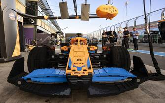 MELBOURNE GRAND PRIX CIRCUIT, AUSTRALIA - APRIL 06: Daniel Ricciardo, McLaren, and Lando Norris, McLaren, with a Lego F1 car during the Australian GP at Melbourne Grand Prix Circuit on Wednesday April 06, 2022 in Melbourne, Australia. (Photo by Glenn Dunbar / LAT Images)