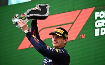 IMOLA, ITALY - APRIL 24: Race winner Max Verstappen of the Netherlands and Oracle Red Bull Racing celebrates on the podium during the F1 Grand Prix of Emilia Romagna at Autodromo Enzo e Dino Ferrari on April 24, 2022 in Imola, Italy. (Photo by Clive Mason/Getty Images)