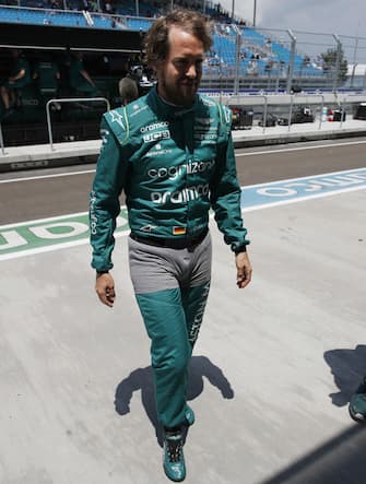 MIAMI INTERNATIONAL AUTODROME, UNITED STATES OF AMERICA - MAY 06: Sebastian Vettel, Aston Martin, with boxer shorts on the outside of his race suit during the Miami GP at Miami International Autodrome on Friday May 06, 2022 in Miami, United States of America. (Photo by Zak Mauger / LAT Images)