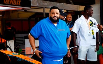 MIAMI, FLORIDA - MAY 08: DJ Khaled poses for a photo outside the McLaren garage prior to the F1 Grand Prix of Miami at the Miami International Autodrome on May 08, 2022 in Miami, Florida. (Photo by Jared C. Tilton/Getty Images)